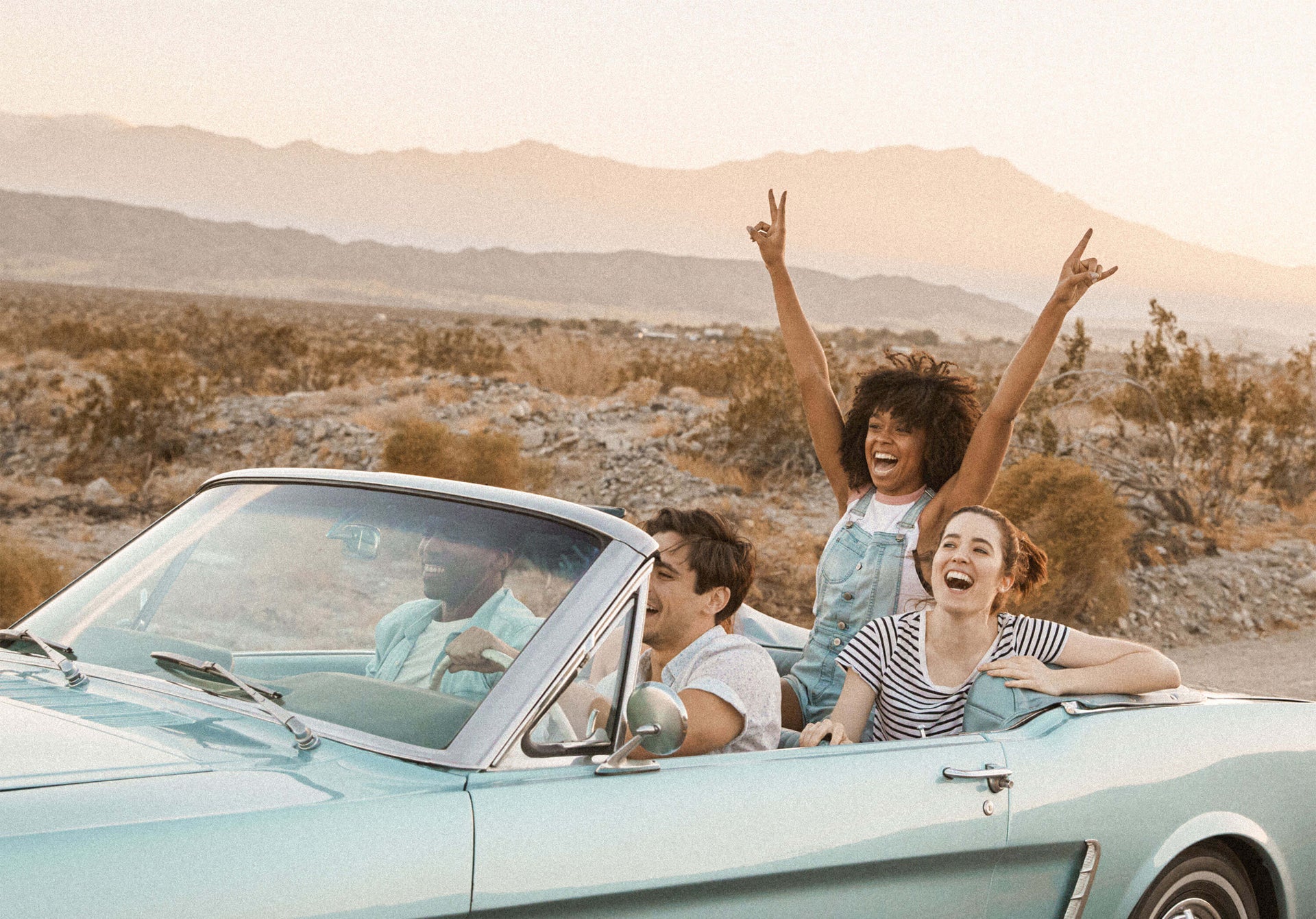 group of friends in car